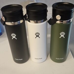 Hydro Flask Trio - Black, White, and Green Bottles
